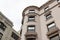 Elaborate stone details on the exterior of a painted brick stone apartment dwelling