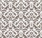 Elaborate white vintage seamless pattern on brown background
