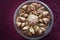 Elaborated bread with spices on damask tablecloth