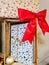 Elaborately wrapped gifts with a bow to decorate a shop window