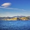 Elba island, Portoferraio village skyline and lenticular cloud.