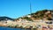 Elba island, sea, rocks and parked boats