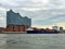 Elbe Philharmonic a concert hall and the Encounter container ship