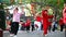 elder Chinese people doing Tai Ji exercise in a park in the morning