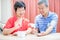 Elder couple use blood manometer