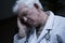 Elder doctor suffering for migraine