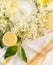 Elder flowers, sugar and lemons, top view