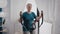 Elder person training on electronic stationary bicycle