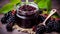 Elderberry jam nestled in a glass jar on a wooden table