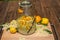 The elderflower liqueur is ready made, all ingredients are in the big preserving jar, fresh elderflowers, oranges and lemon slices