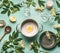 Elderflowers syrup or jam cooking preparation. Flat lay of Elder flowers with spoon, pot, glasses, sugar and lemon