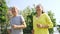 Elderly asian couple exercising outdoors