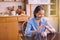 Elderly asian woman hand cover above piggy bank for retirement,Saving money concept