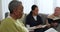 Elderly black woman, bible and group in home, worship and prayer together. Senior people, religion and study, spiritual