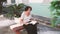 Elderly brazilian woman reading a book