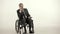 Elderly businessman in wheelchair