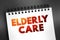 Elderly care - eldercare serves the needs and requirements of senior citizens, text concept on notepad
