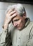 Elderly caucasian man with worried thoughtful expression