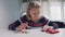 Elderly caucasian woman counting small amount of coins left from her pension