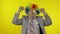 Elderly clown businessman entrepreneur dancing, celebrate, making silly faces