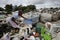 Elderly collecting waste for recycling