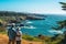 Elderly Couple Admiring Coastal Beauty, senior tourists hiking