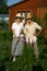 The elderly couple at a bush of button snakeroot