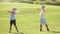 Elderly couple doing exercise.