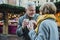 Elderly Couple Drinking Hot Drinks at Christmas Market!