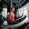Elderly couple make healthy lifestyle choice to exercise in gym