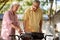 Elderly couple making barbeque
