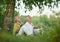 Elderly couple on nature at summer