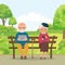 Elderly couple in the park with gadgets