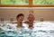 Elderly couple in pool