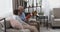 Elderly couple reading a book at home