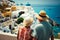 Elderly couple tourists looks at sea among traditional Greek white houses in summer, back view. Ai generated