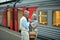 Elderly couple at train station