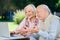 Elderly Couple Video Chatting On Laptop