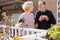 Elderly cuople talking at balcon