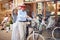 Elderly family in shopping buying new bicycle for surprise