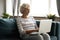 Elderly female using laptop search information online