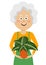 Elderly gardener woman holding flower in a pot on white