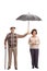 Elderly gentleman holding an umbrella over an elderly woman