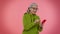 Elderly granny woman use mobile phone browsing online say wow yes, big win news doing winner gesture