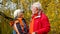 Elderly gray-haired optimistic couple