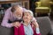 Elderly grey-haired couple looking at each other