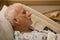 Elderly hospital patient sleeping