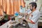 Elderly Iranian man is preparing food, Tehran, Iran.