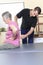 Elderly lady with her physiotherapist in a
