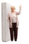 Elderly lady leaning on a bed mattress and pointing up